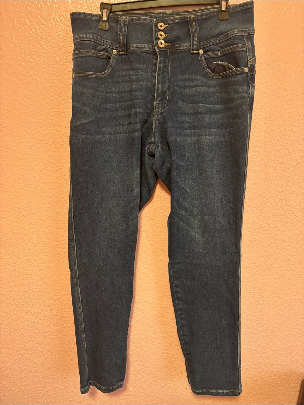 High-Rise Triple-Button Skinny Jeans in Dark Blue